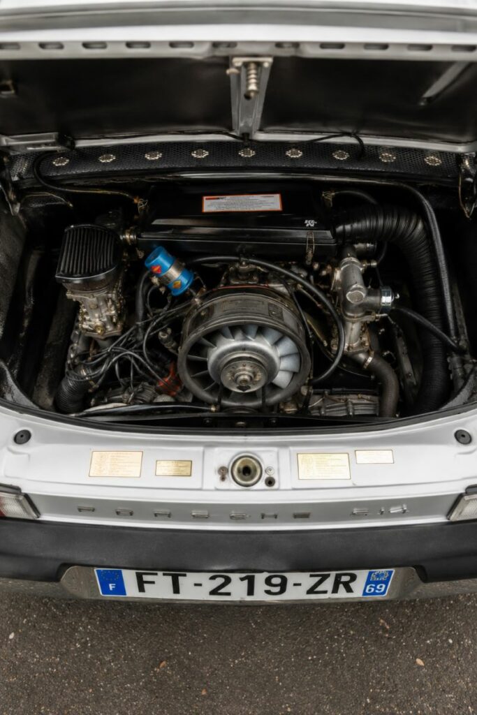 Moteur quatre cylindres à plat Type 4 d'une Porsche 914, apprécié pour sa robustesse, sa simplicité mécanique et son entretien relativement accessible.